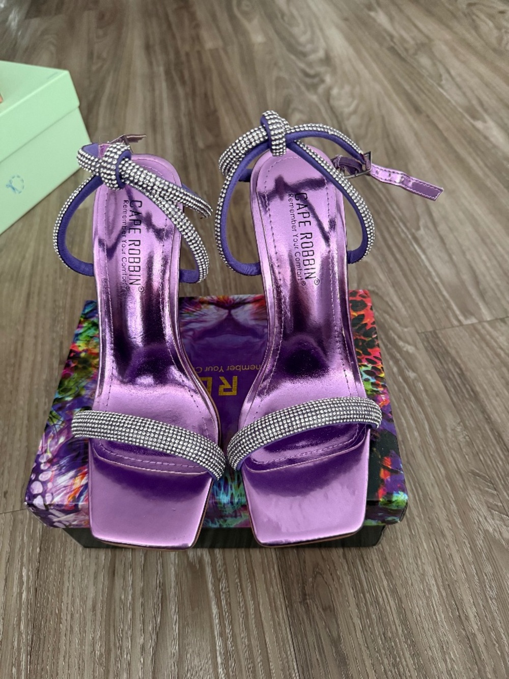 Purple and rhinestone ankle heels